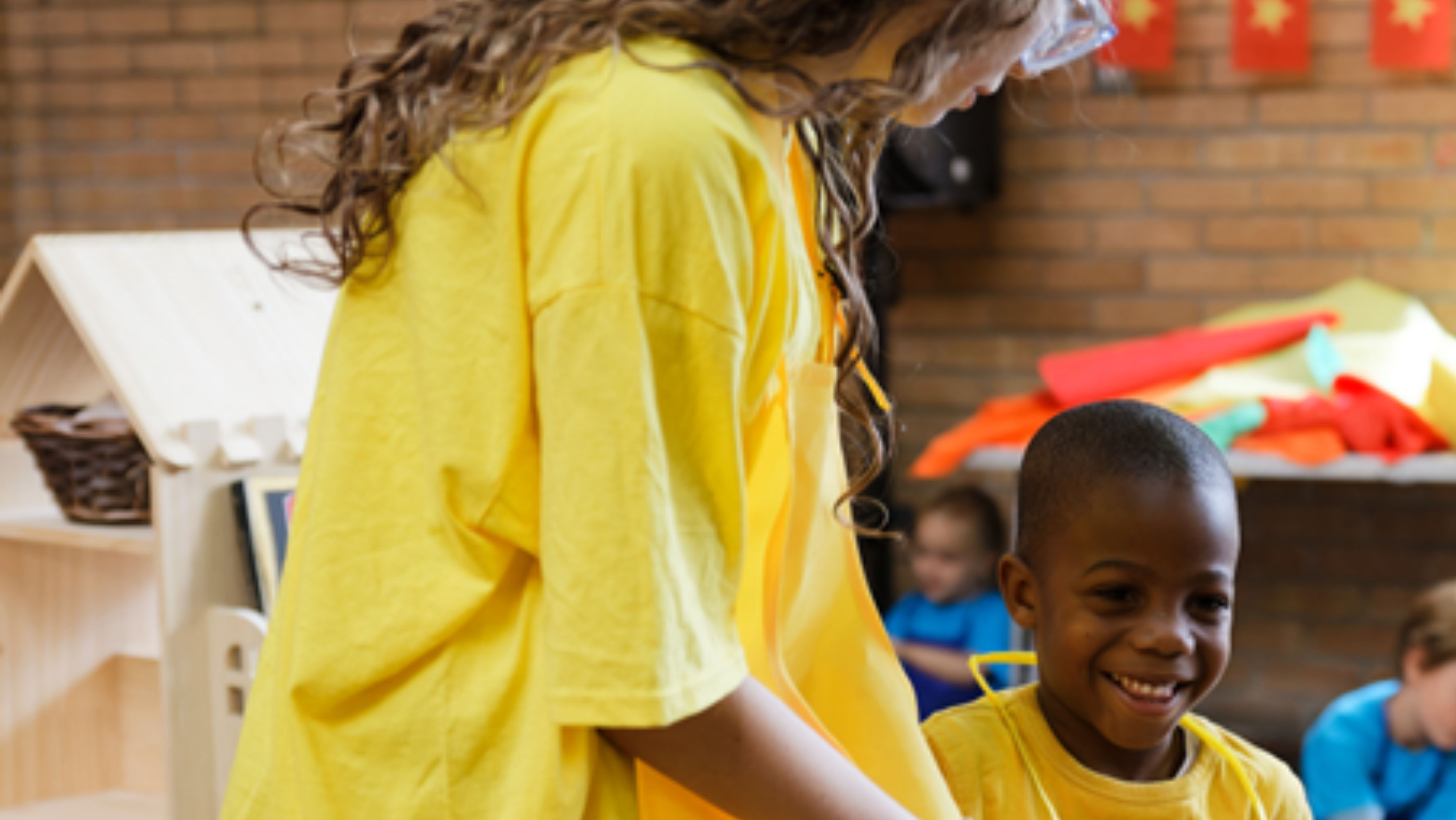 Smiles at our Youth Theatres two young people smiling