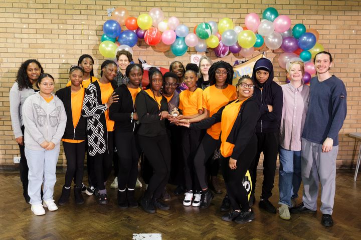 Advanced Youth Theatre pose with their Social Action trophy.