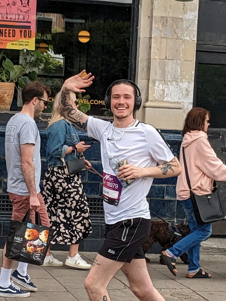 Youth Drama Leader, Deane Dixon-Foster, running past the Adam & Eve.