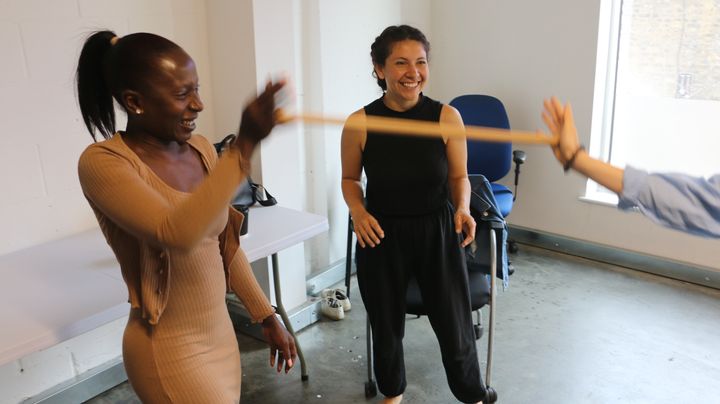 Participants move around the studio space during a workshop with Hilanderas.with 